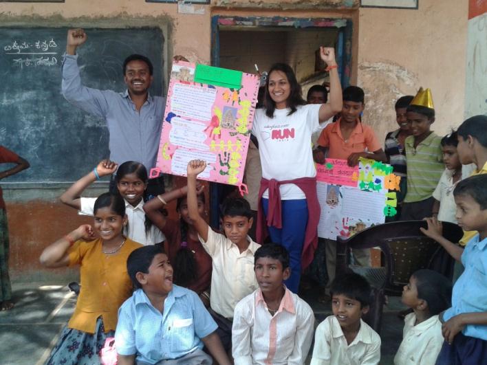 School children and Salesforce volunteers after completion of project work (poster) on Hampi  