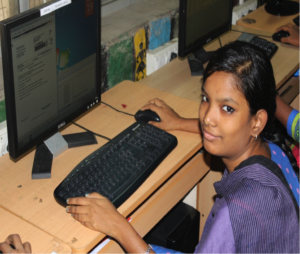 girl at computer who attended workshop
