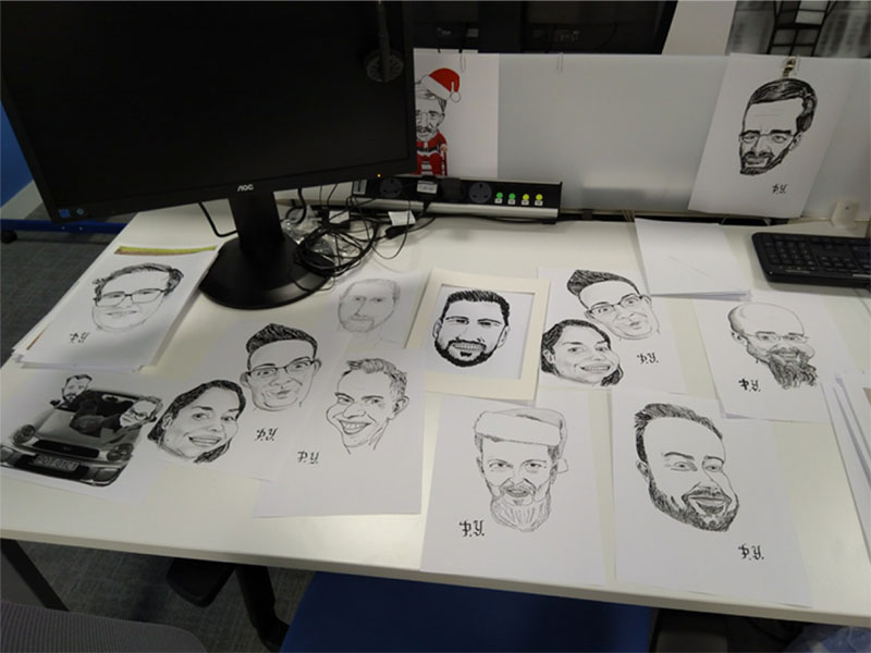 Caricatures for sale as part of The Apprentice Week, an initiative which raised $30,000 for charitable causes.