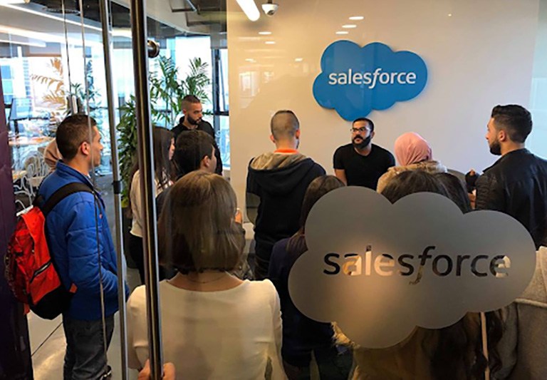 People standing in Salesforce office