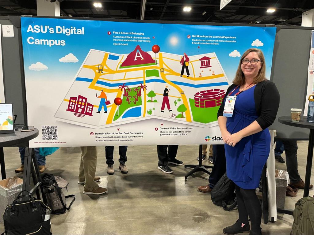 One person standing in front of a graphic showing ASU’s digital campus.