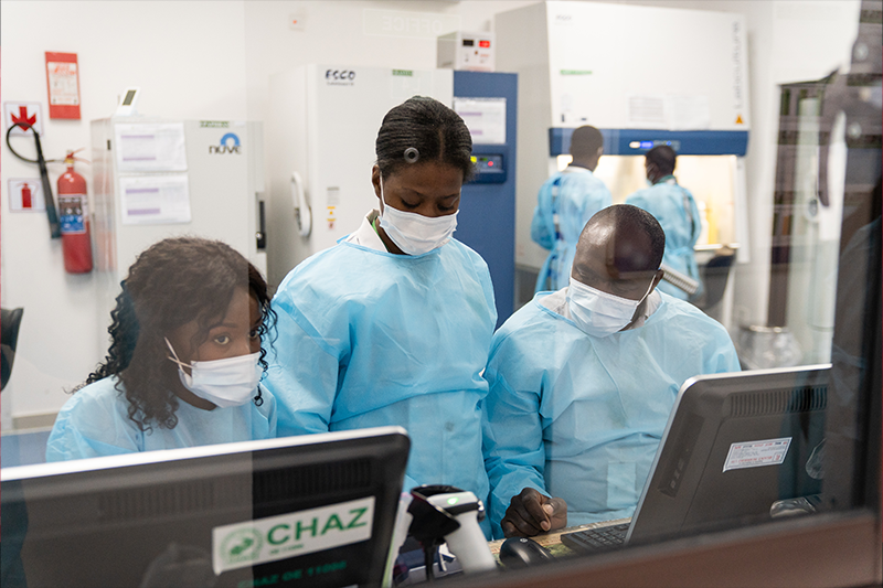Cynthia Banda Cassande and colleagues in a HIV testing lab at the CHAZ Laboratory in Lusaka, Zambia.
